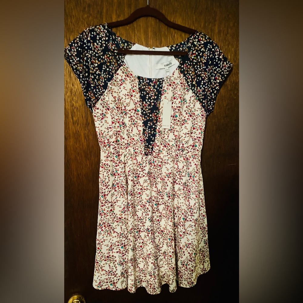 NWT. Isabel Lu Flirty Summer pink & cream floral dress with navy cap sleeve.